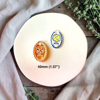 Polymer clay cutter and finished lemon tree earring showing 40mm size