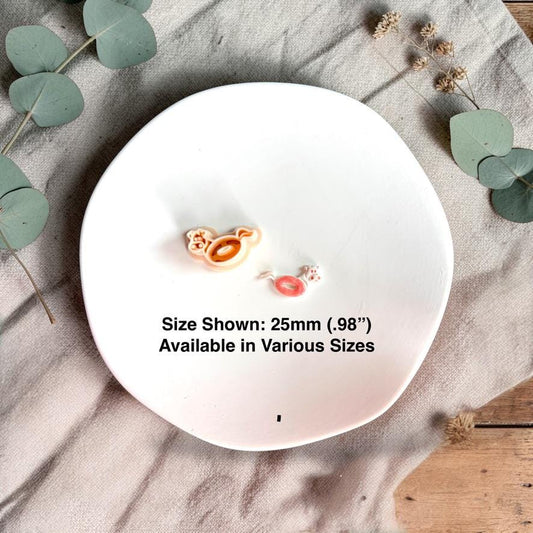 Cutter and clay piece with size text showing 25mm measurement