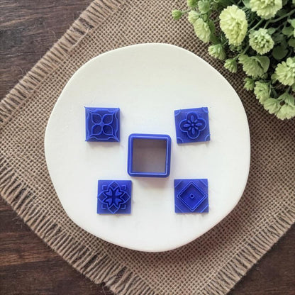Azulejos mosaic tile patterns in blue and neutral tones with detailed impressions