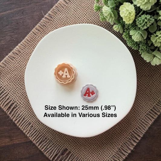 A plus clay earrings with size text shown 25mm