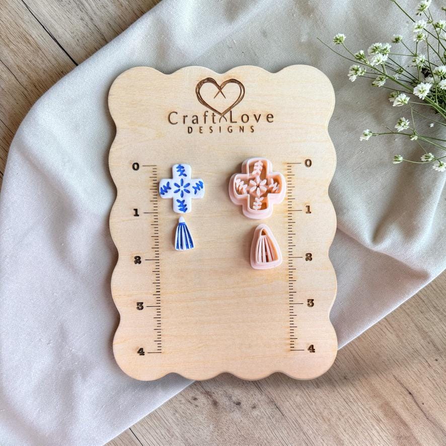 Tile pattern cutter and finished clay earrings displayed on wooden ruler board