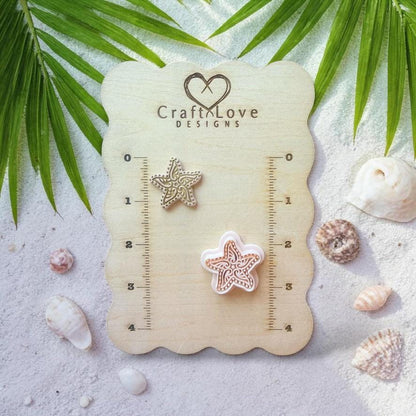 Starfish clay piece and cutter displayed on wooden sizing board with coastal beach decor