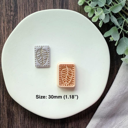 cutter and finished leaf design shown together with size text on white plate
