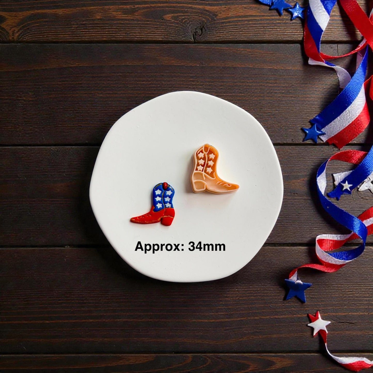 Patriotic cowboy boot cutter and finished clay example shown with approximate 34mm size text on white display surface