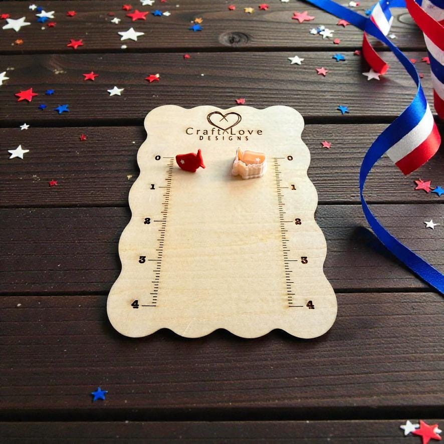 Patriotic USA map clay cutter displayed on wooden measurement board with red white and blue decorations