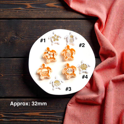 Four tropical sea turtle polymer clay cutters featuring flower, pineapple, sunset, and shell center designs with approximate 32mm sizing text