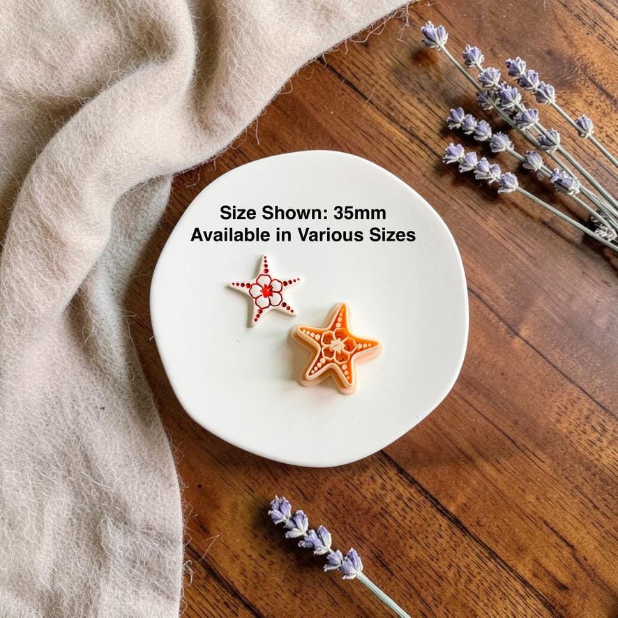 Finished starfish clay earring beside the matching cutter with text showing the 35mm size and that additional sizes are available.