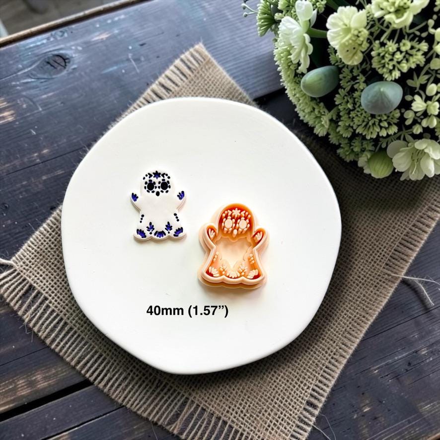 Sugar skull ghost polymer clay cutter with matching embossed sample showing the 40mm size.