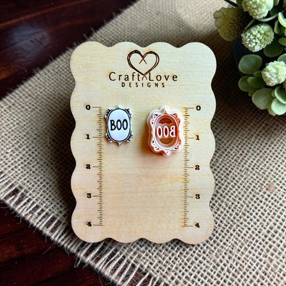 Finished Boo clay design and matching polymer clay cutter displayed on a Craft Love Designs size board
