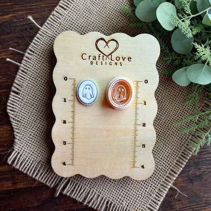 Mini ghost cameo polymer clay cutter and finished clay piece displayed on a Craft Love Designs sizing board.