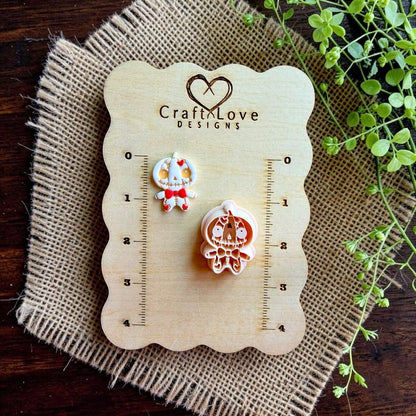 Stitched pumpkin doll cutter and finished clay piece displayed on a Craft Love Designs sizing board.