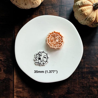 35 mm spooky polymer clay cutter with black-and-white example clay piece on a white plate, labeled 35 mm and 1.377 inches.