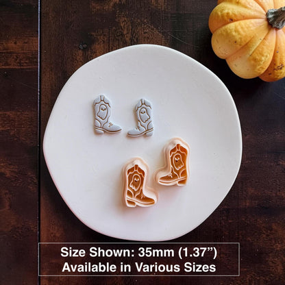 Finished light-colored ghost cowboy boot pair above the matching peach cutters on a white surface; text states size shown is 35mm (1.37") and available in various sizes.