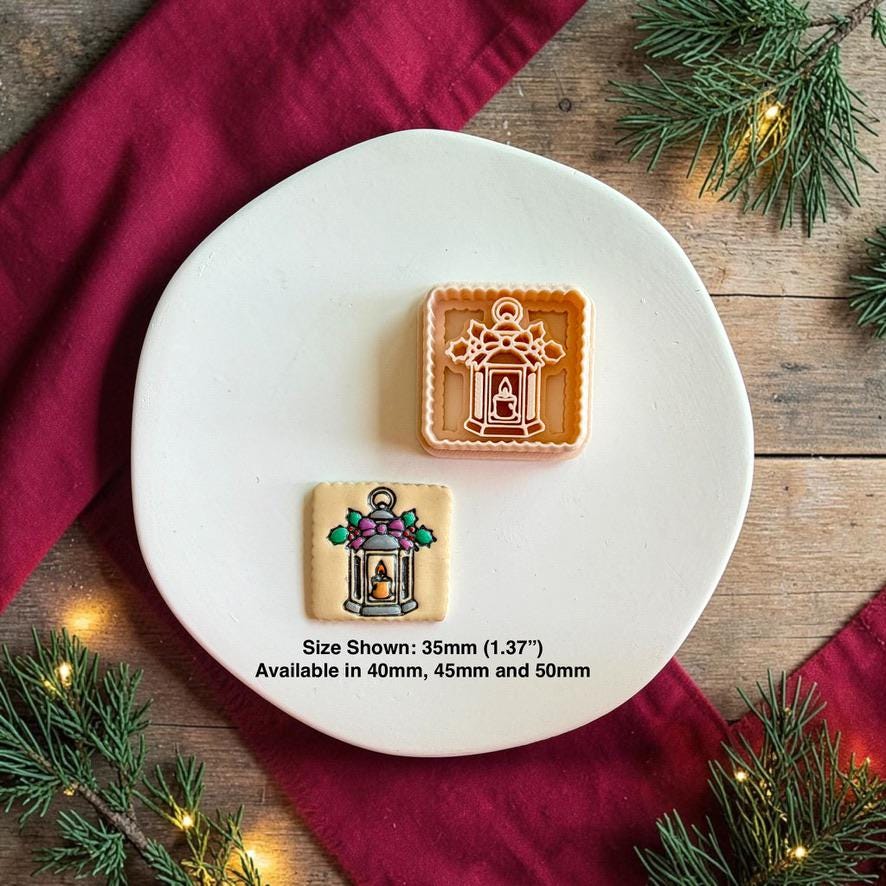 Christmas lantern polymer clay cutter beside the finished colored clay piece on a white plate, with text showing the 35mm size pictured and availability in 40mm, 45mm, and 50mm.